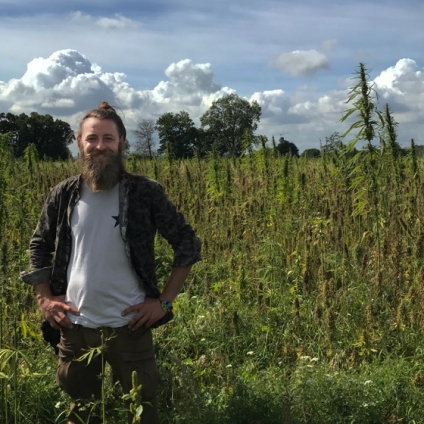 Cooperative member Dima in one of the Cooperatives organic hemp fields in Oxfordshire
